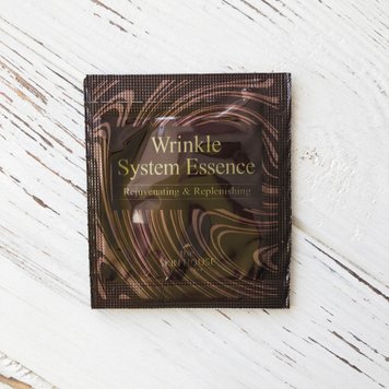 Пробник Антивікова есенція з колагеном The Skin House Wrinkle System Essence, 2 мл фото