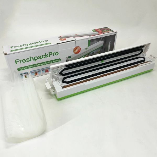 Вакууматор Freshpack Pro вакуумний пакувальник їжі, побутової. Колір зелений фото