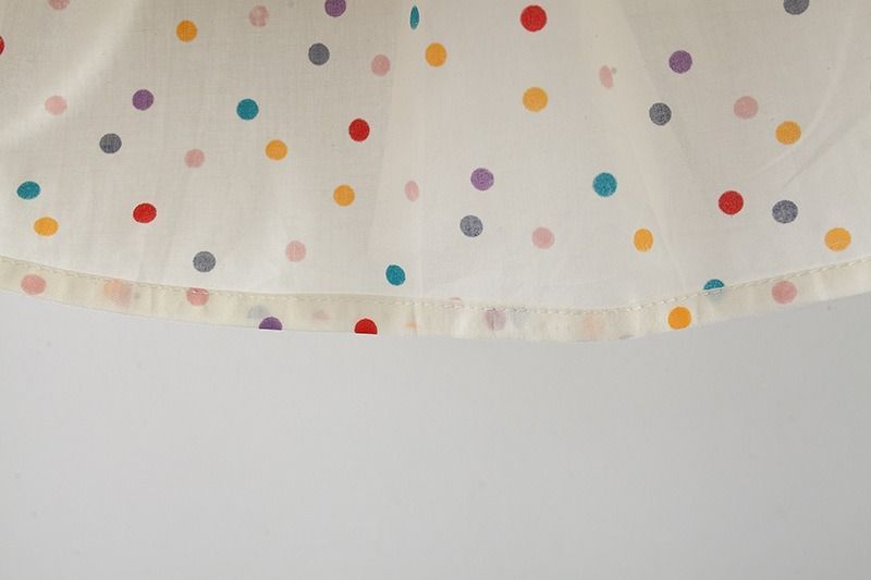 Сукня дитяча у горошок з вишитими квіточками фото