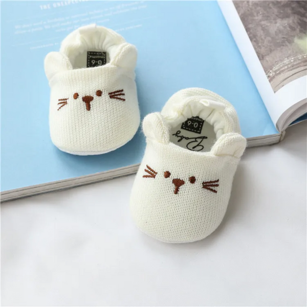 Хлопковые вязаные пинетки Diana Textile Kittens бежевый 12 см (7-12 месяцев), молочный фото